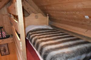 Maisons de vacances VAUJANYLOCATIONS - Chalet Perin : photos des chambres