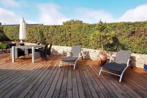 Eksklusiv sommerhus beliggende i vandkanten