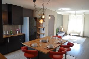 Appartements Le Saint-Bernard : photos des chambres