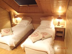 Chalets Le Chalet du Pont des Fees - Sauna & SPA : photos des chambres