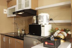 Well Appointed & Stylish 2BR at Jarrdin Cihampelas Apartment By Travelio