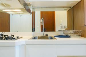 Relax Studio Apartment at Capitol Park Residence By Travelio