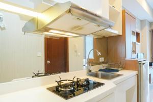 Relax Studio Apartment at Capitol Park Residence By Travelio