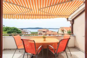 Two-Bedroom Apartment with Terrace and Sea View room in Apartments with a parking space Medulin - 7495