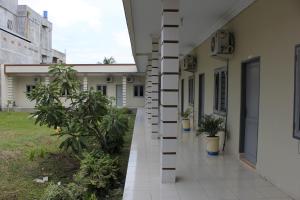 Penginapan Transit Tomato