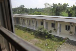 Penginapan Transit Tomato