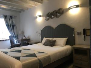 Hotels Logis Hotel Oasis : photos des chambres