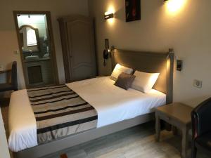 Hotels Logis Hotel Oasis : photos des chambres