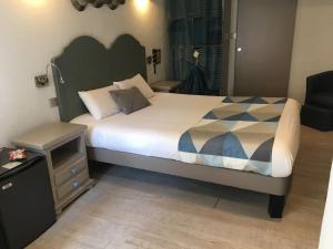 Hotels Logis Hotel Oasis : photos des chambres