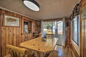 Riverfront Grayling Retreat with Fire Pit and Dock!