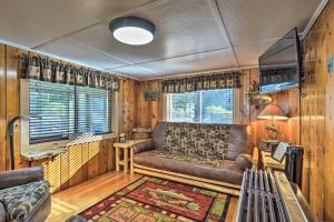 Riverfront Grayling Retreat with Fire Pit and Dock!