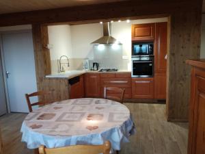 Appartements Gite Le p'tit Chasseral : photos des chambres