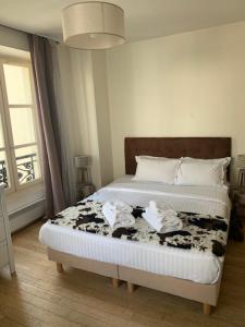 Appartements Lovely parisien apartment (opera 3) : photos des chambres