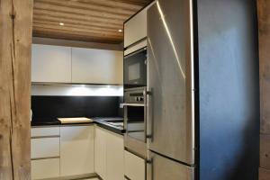 Les Gentianes Appartement 5 personnes à 50 mètres des pistes Meribel 3 vallées