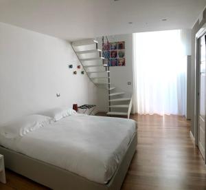 Deluxe Quadruple Room room in Lo Schiaccianoci B&B