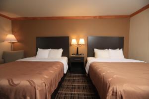Queen Room with Two Queen Beds room in Quality Inn DFW Airport North