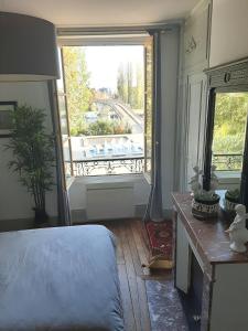 Appartements Et au pied coule une riviere, situation et vue ideales : photos des chambres