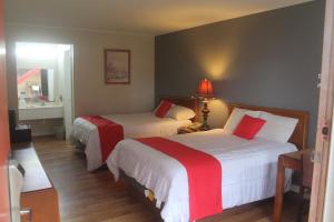 Standard Quadruple Room room in SPRINGWOOD HOTEL Opelika I-85 Columbus Pkwy