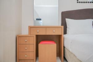 Furnished and Simple Living Studio Serpong Greenview Apartment By Travelio