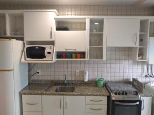 Apartamento de 2 quartos a 3 minutos a pé da praia de Cachoeira de Bom Jesu com águas calmas