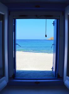 Traditional house on the beach front in the area of Otzia, Kea Kea Greece