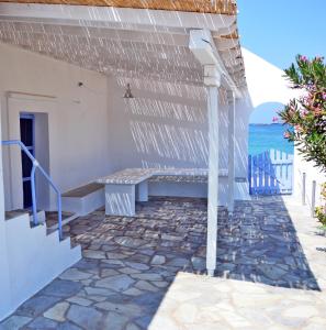 Traditional house on the beach front in the area of Otzia, Kea Kea Greece
