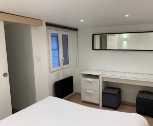 Appartements Le petit Rougemare avec parking inclus : photos des chambres