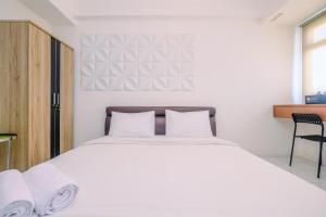 Cozy and Tranquil Studio Apartment at Gunung Putri Square By Travelio