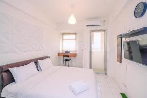 Cozy and Tranquil Studio Apartment at Gunung Putri Square By Travelio