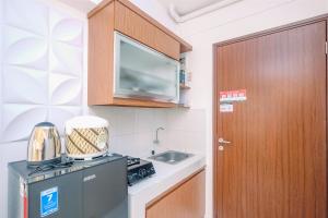 Cozy and Tranquil Studio Apartment at Gunung Putri Square By Travelio