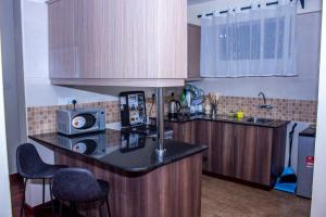 Kasty M Apartments- W Place