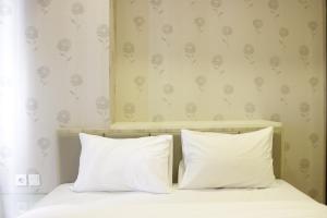 Homey and Chic 2BR Apartment Newton Residence Bandung By Travelio