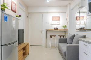 Relaxing 2BR at Bassura City Apartment By Travelio