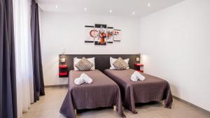 Appart'hotels Hotel De L'Horloge : photos des chambres