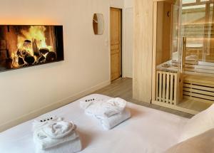 Appartements Suite Cosy Flat - Hyper-Centre avec sauna privatif : photos des chambres