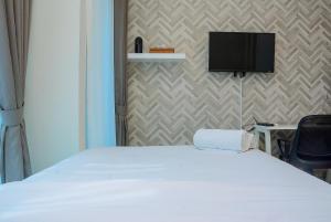 Best Location and New Furnished at Studio Apartment Capitol Park Residence By Travelio