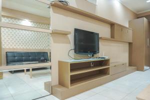 Strategic 1BR The Boulevard Apartment with Luxurious Design By Travelio