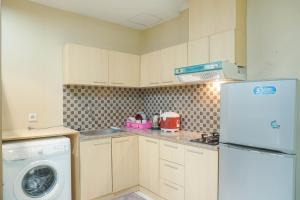 Strategic 1BR The Boulevard Apartment with Luxurious Design By Travelio