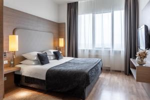 One-Bedroom Apartment room in Ramada Encore Kyiv