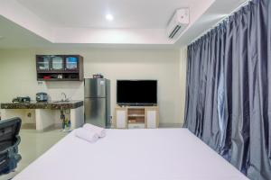 Cozy with Minimalist Style Studio Apartment Nine Residence By Travelio