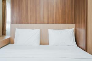 Fully Furnished with Comfortable Design 2BR Apartment Atria Residences By Travelio