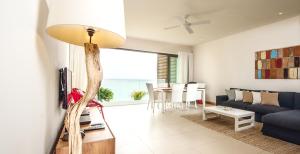 Cap Ouest Beachfront Residences