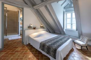 Appartements Le Pigeonnier : photos des chambres