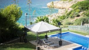 TarracoHomes, TH52 Villa Lighthouse con Piscina Privada, Terraza, y Vistas al Mar