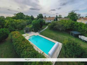 Maisons de vacances LA GRANGE DE BELLEFONTAINE et sa piscine privee : photos des chambres