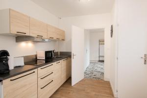 Appartements Le stade : photos des chambres