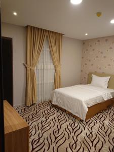 اجنحة النرجس الفندقية