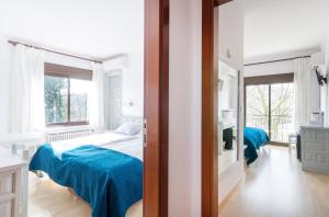 Two Connecting Double Rooms (3 Adults) room in Els Caçadors de Maçanet