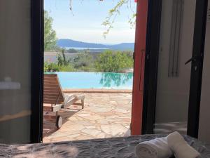 Villas Belle villa traditionnelle vue mer avec piscine a 1,5 km de la plage de Pinarello : photos des chambres