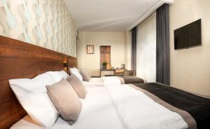 Hotel Bossuite Business